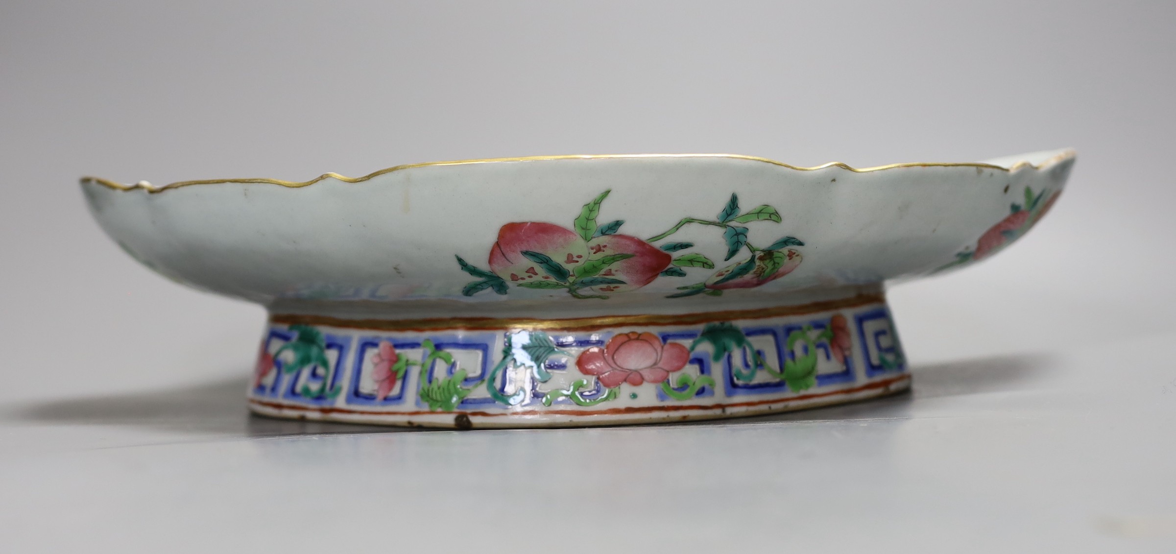 A Chinese Canton oval footed dish, 36cm wide, and a Japanese box with floral decoration and intertwining scroll hinge